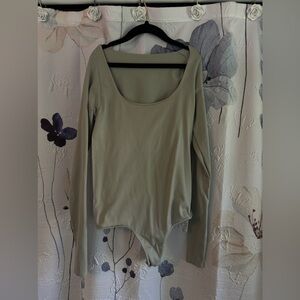 SKIMS Essential Long Sleeve Scoop Neck Bodysuit in Agave